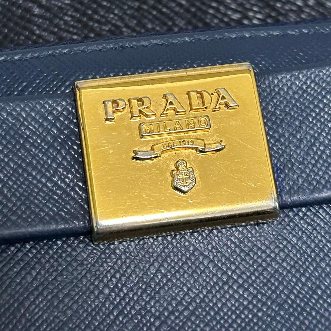PRADA プラダ　長財布　ラウンドジップ　リボン　ブルー　ゴールドロゴ