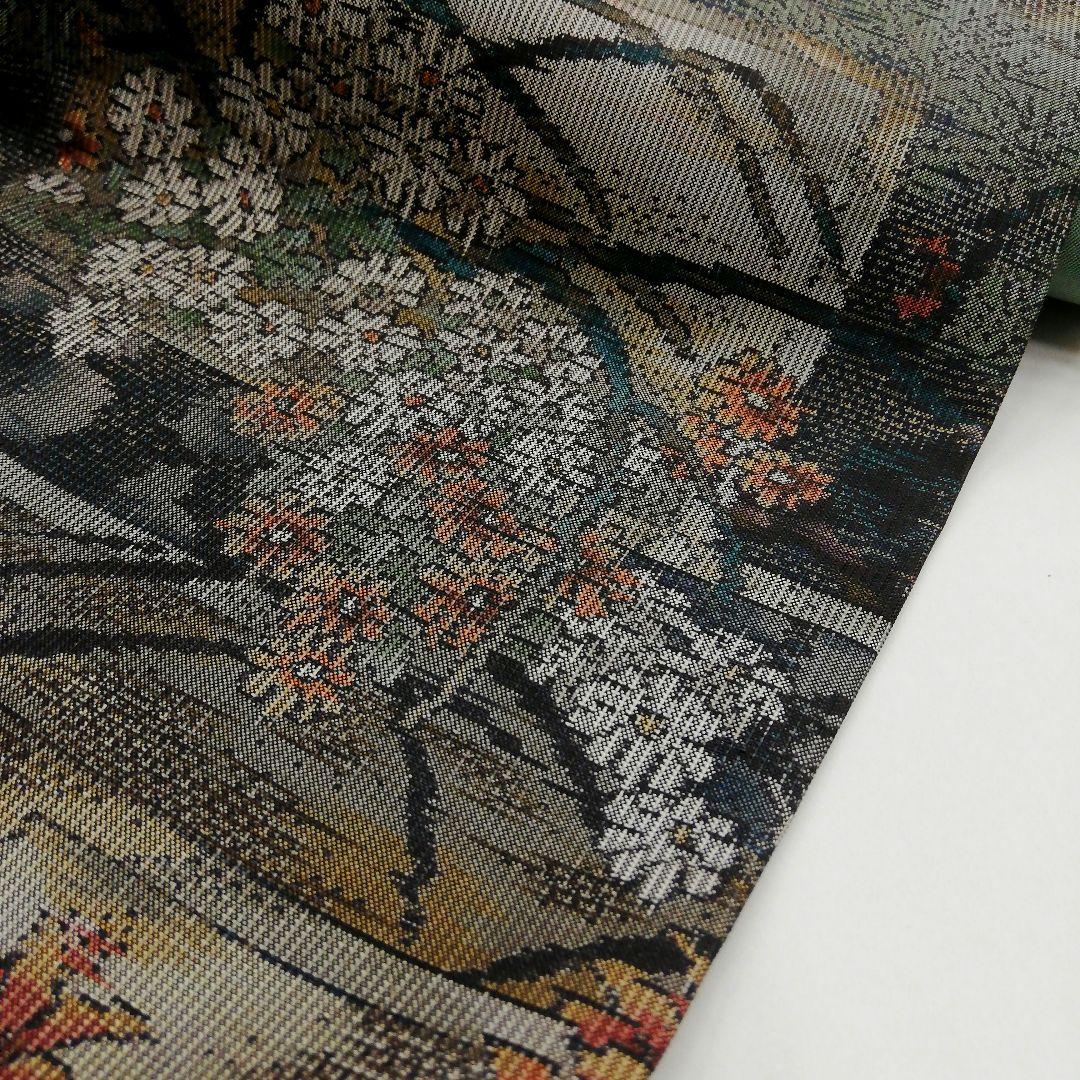 本場大島紬(袷)　(四季の草花紋様　恵 積五郎(絣の魔術師)　裄68㌢身幅広め)