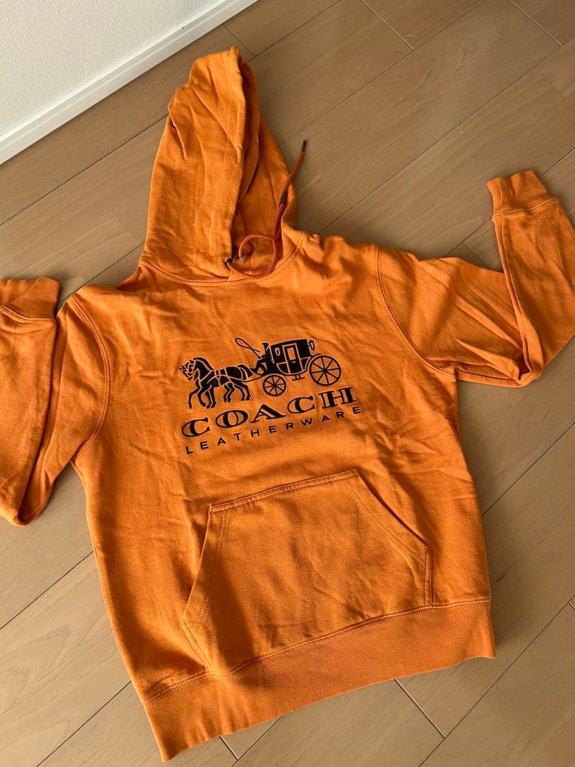 COACH オレンジ パーカー