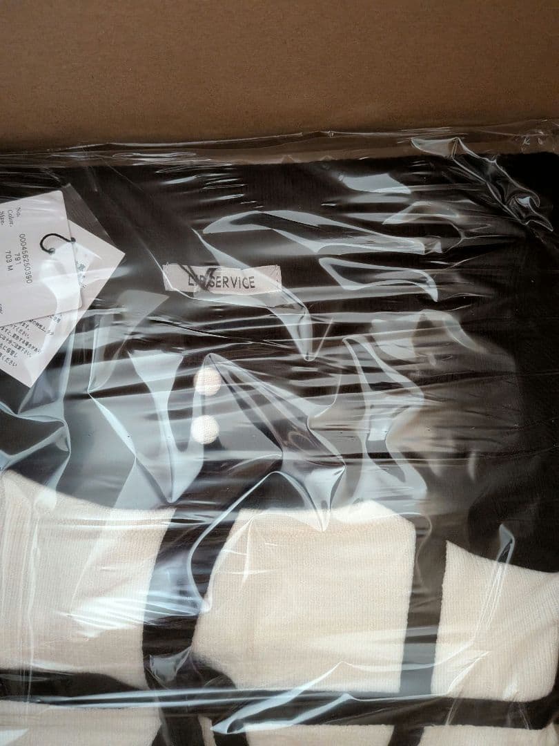 新品　タグつき　デコルテオープンバイカラーリボンニットワンピース