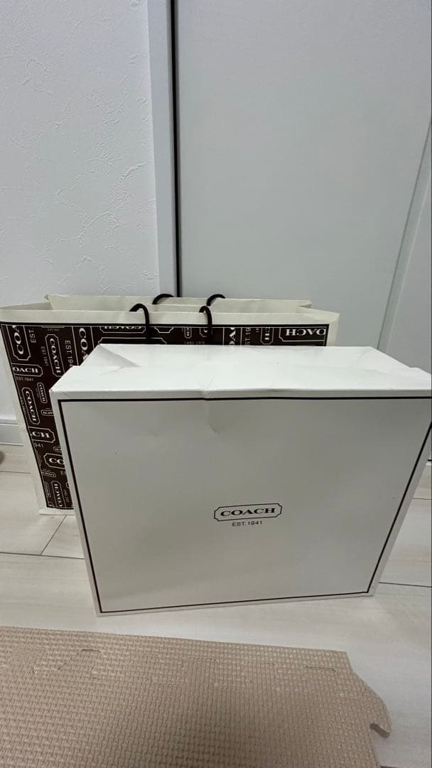 COACH ブラック ロゴパターン バッグ