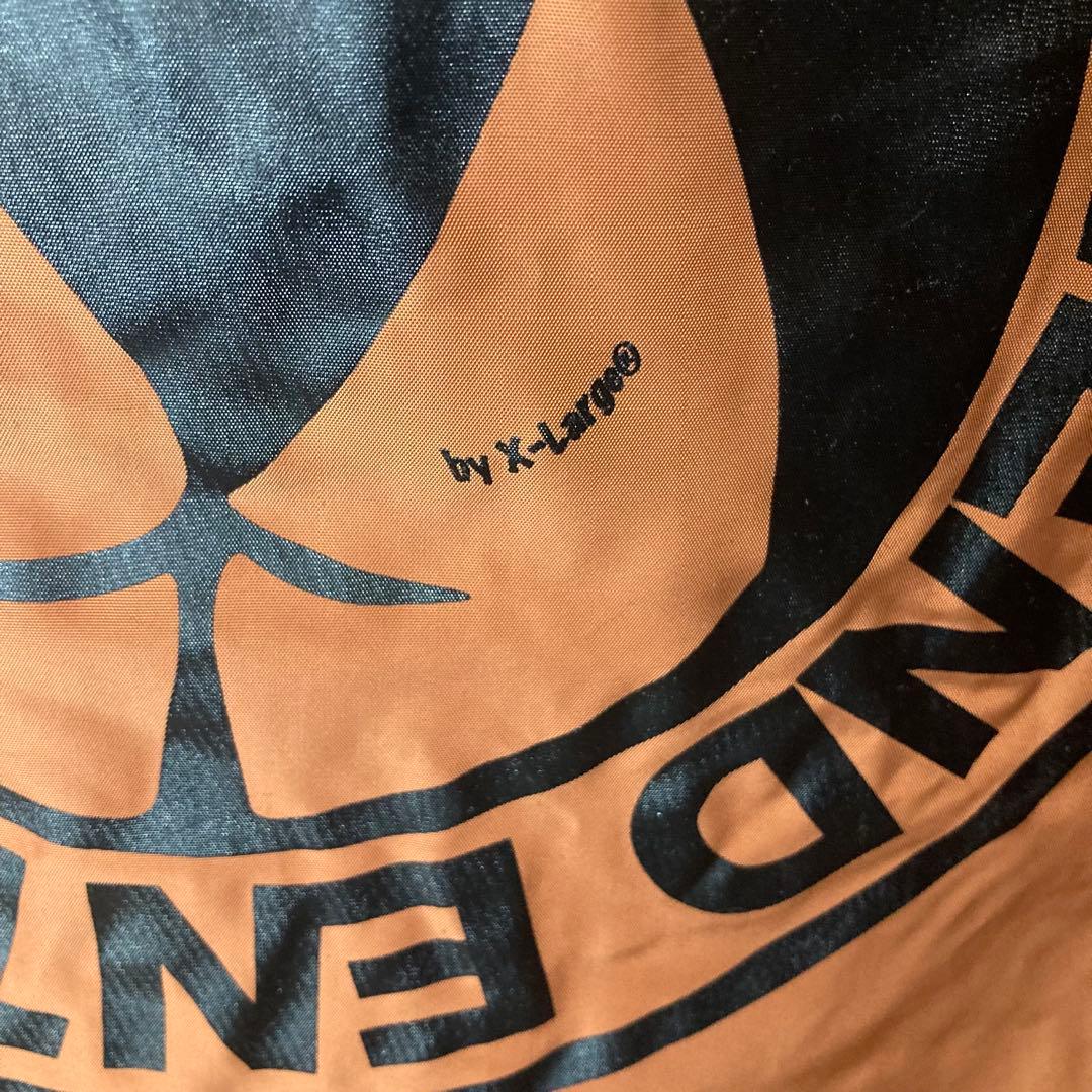 XLARGEギャルヒップビッグプリントくすみオレンジ裏ボアコーチジャケットL