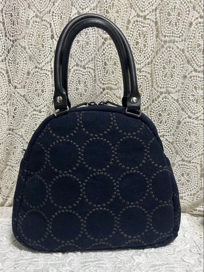 51210Aミナペルホネンハンドメイド　ブガッティラウンドバッグ