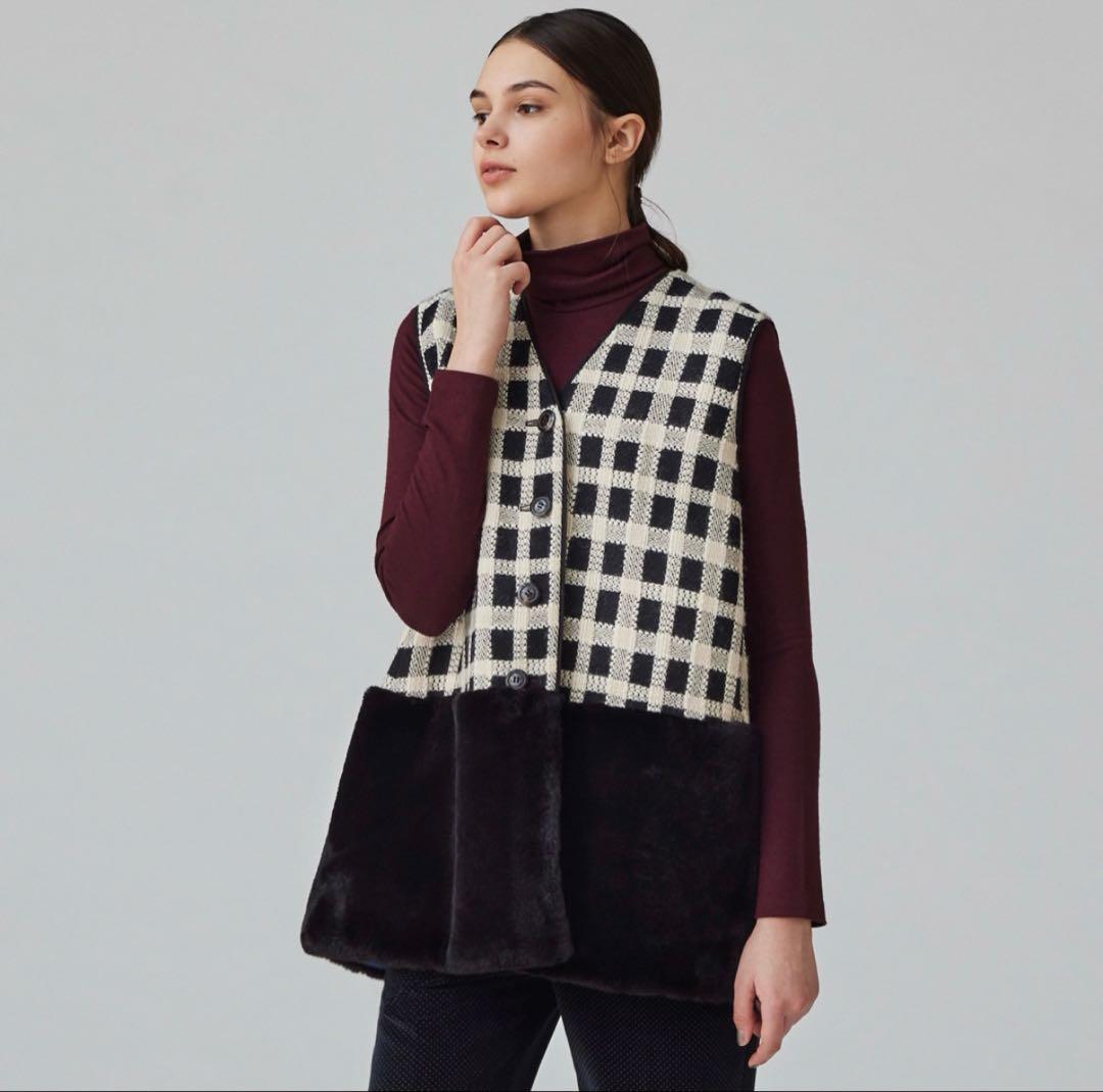 TOMORROWLAND 　タッタ—シェパード ファーペプラムジレ