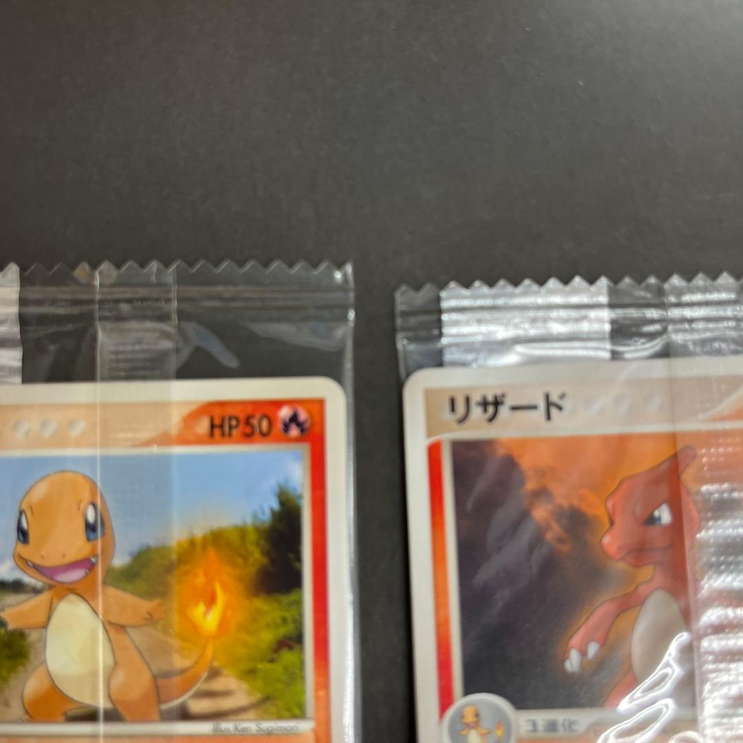 【未開封】ポケモンプロモMeiji明治　ヒトカゲ・リザード・リザードン3枚セット