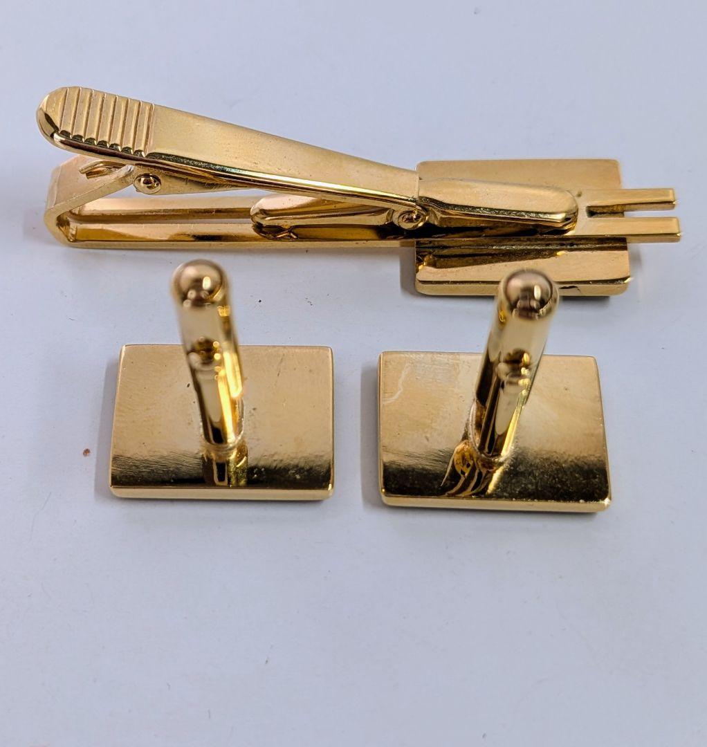 【美品】HERMES エルメス　ネクタイピン＆カフスセット　ゴールド＆ブラック