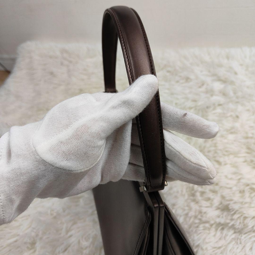 本日限定価格　グッチ　ハンドバッグ　トップハンドル　がま口　ロゴ金具　肩掛け