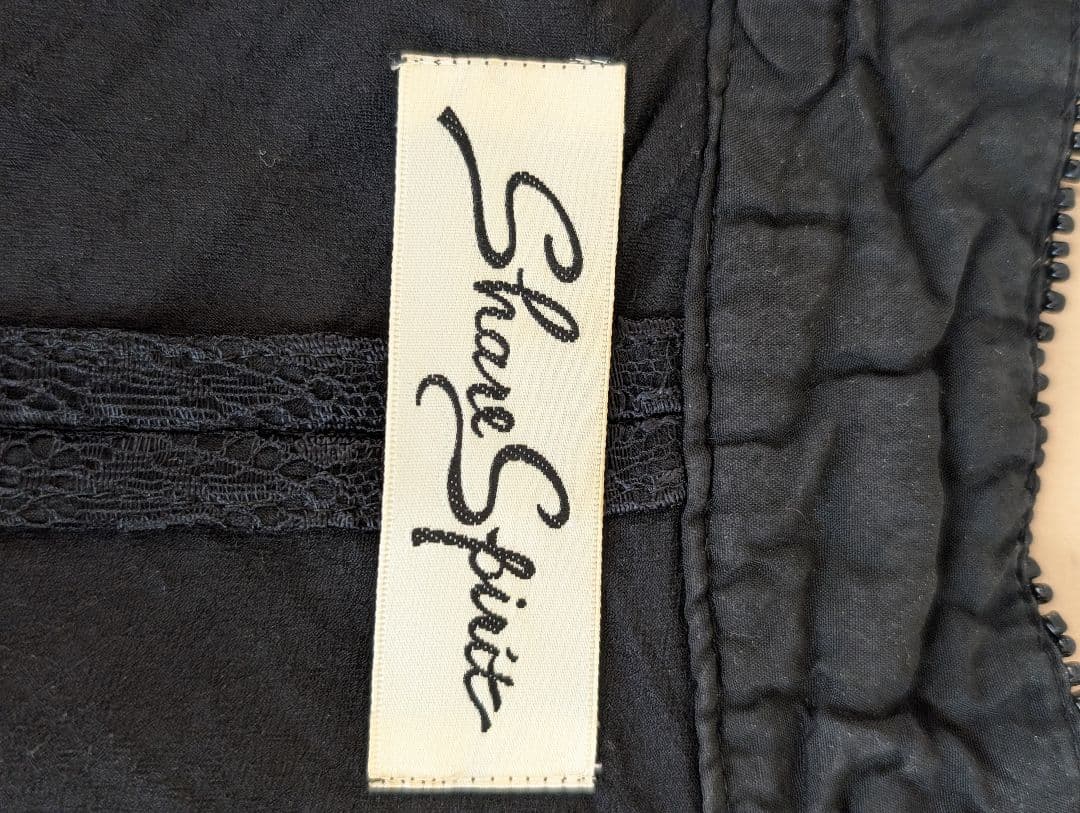 トップス sharespirit