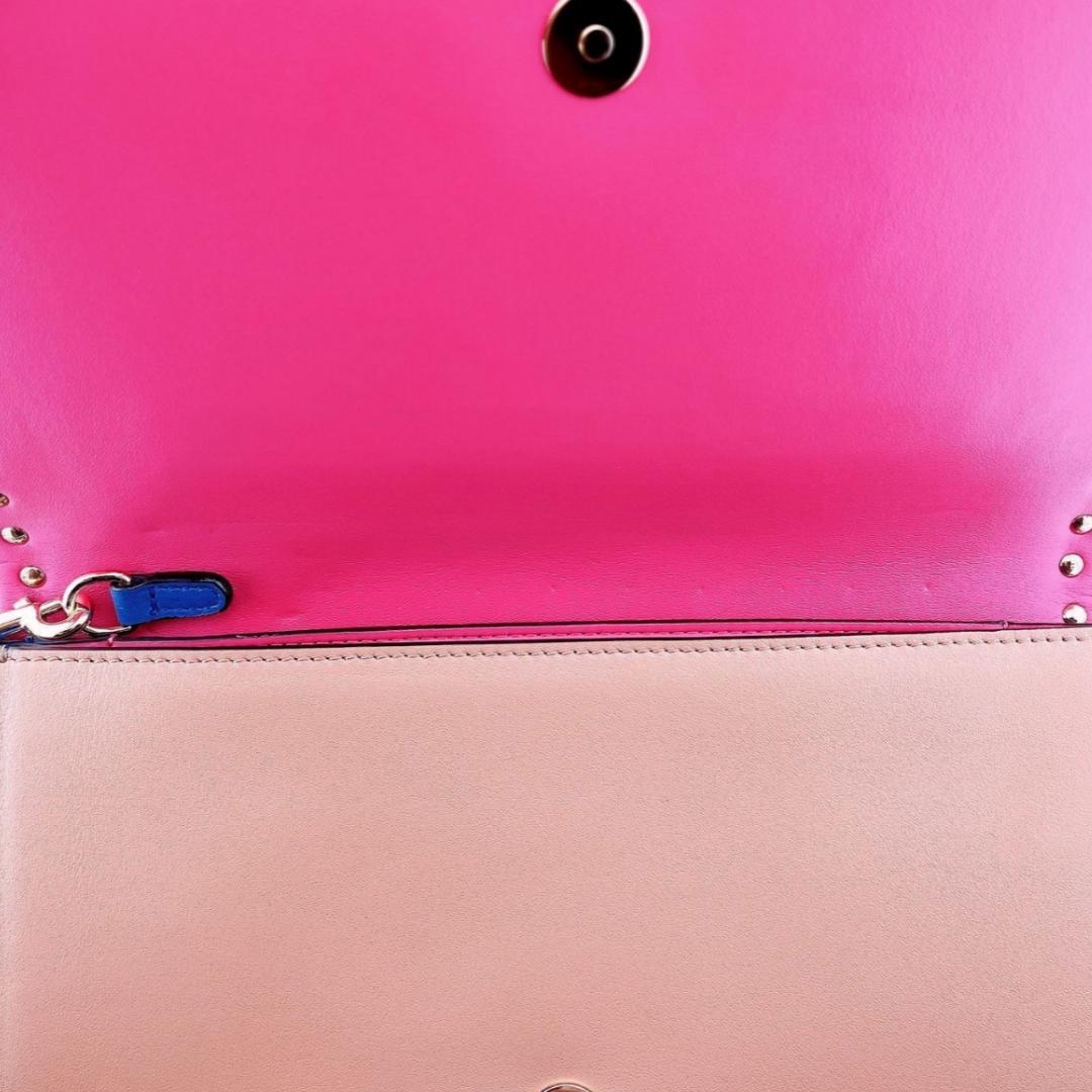 ヴァレンティノガラヴァーニ クラッチバッグ ブルー ロックスタッズ マルチカラー