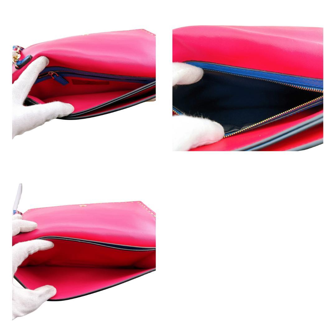 ヴァレンティノガラヴァーニ クラッチバッグ ブルー ロックスタッズ マルチカラー