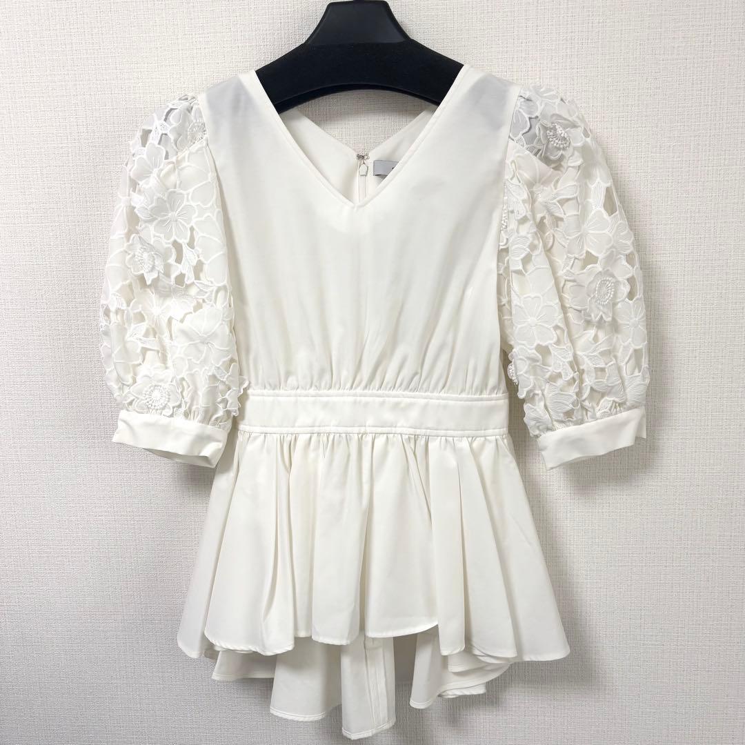 新品sheller スリーブフラワーペプラムトップス