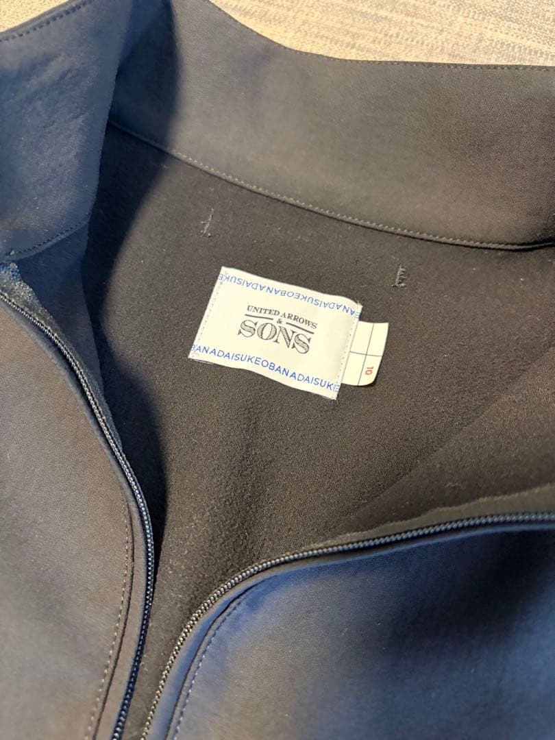 DAISUKE OBANA +10 HALF ZIP STAND/スタンドシャツ