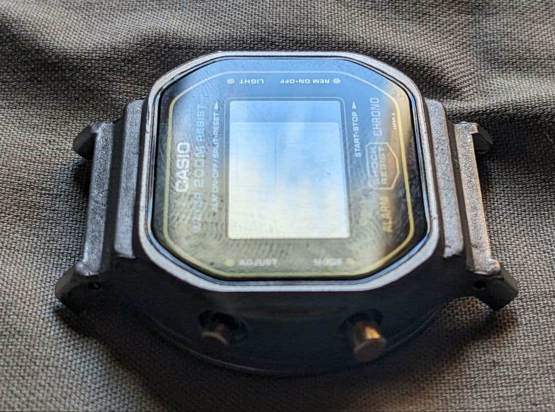 B*N様 DW-5600c-9v ゴールド 901 200m表示 フェイス面キズ