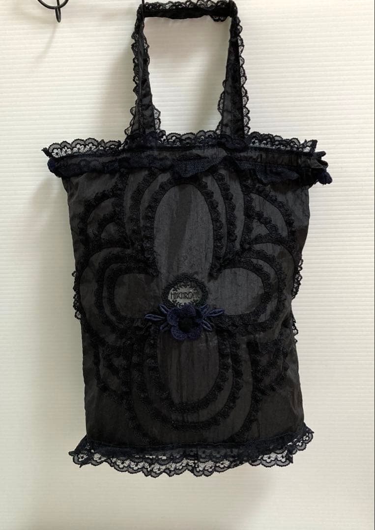 さえら　ヒスクローネ 黒色の手提げ