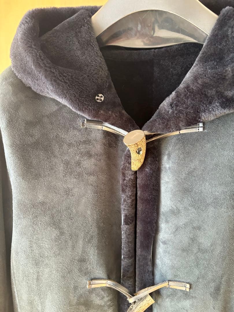 極美品/定価約28万】UNKNOWN 英国製 リアルムートン フーデッドコート