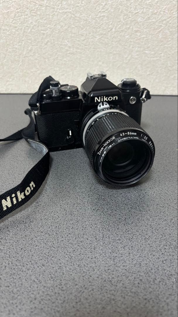 一眼レフカメラNikon FE 43-86mmレンズ付き　。モータードライブ。