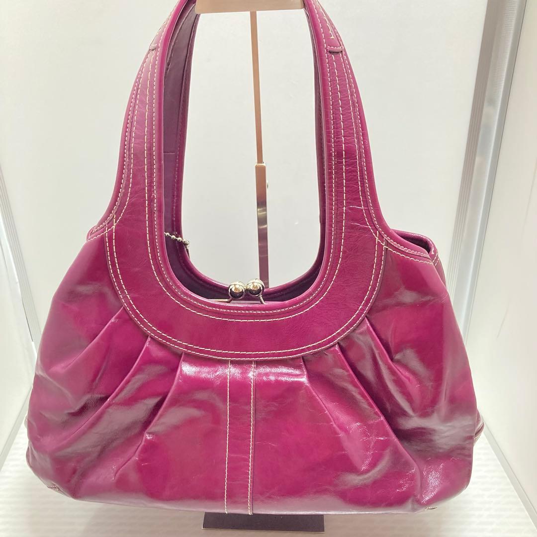 美品　コーチ エルゴ ergo パテントレザー がま口 Kiss-lock