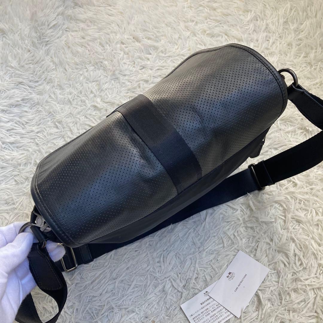 COACH フライトバッグ 黒 ブラック パンチング レザー 革 バックル
