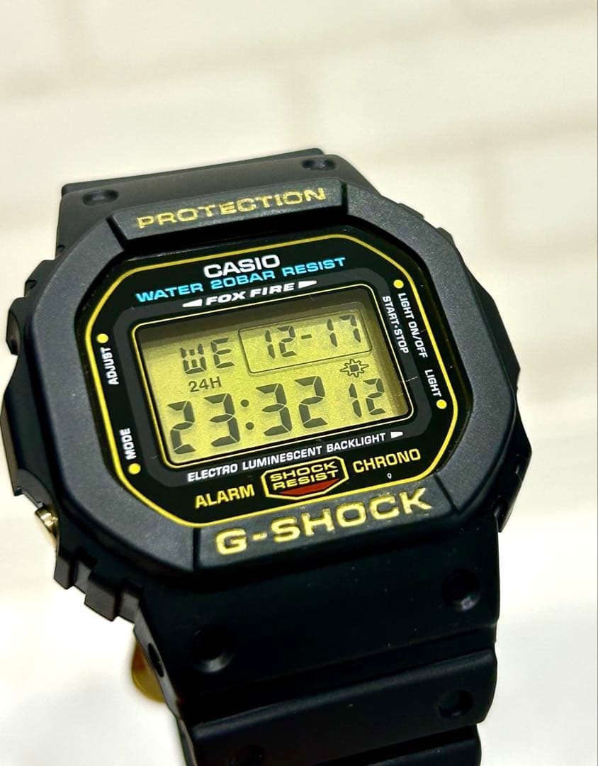 アッツG-SHOCK DW-5600Eゴールド液晶 FOXFIRE