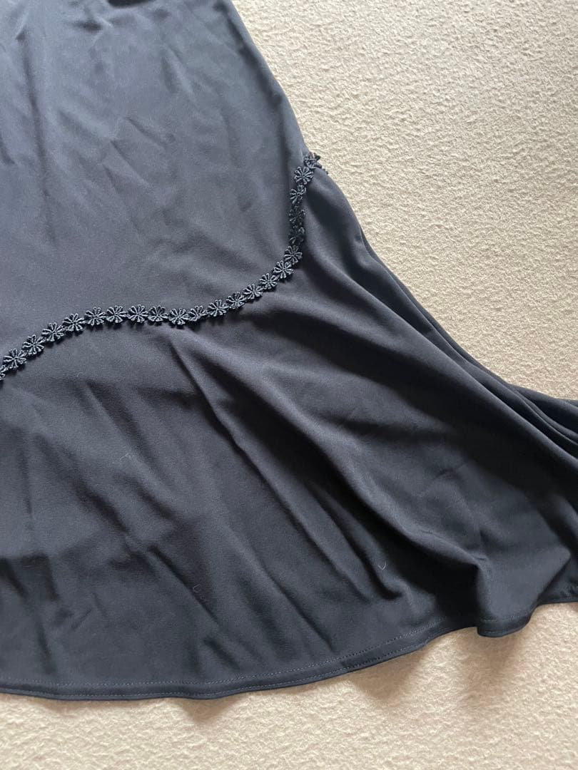 トクコプルミエブォル花柄アシンメトリックチュニック（五分袖）