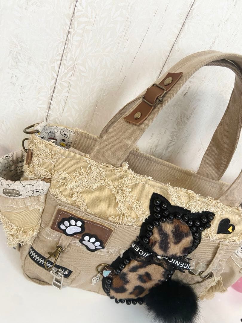 デニムリメイクバックS 茶フリンジ猫