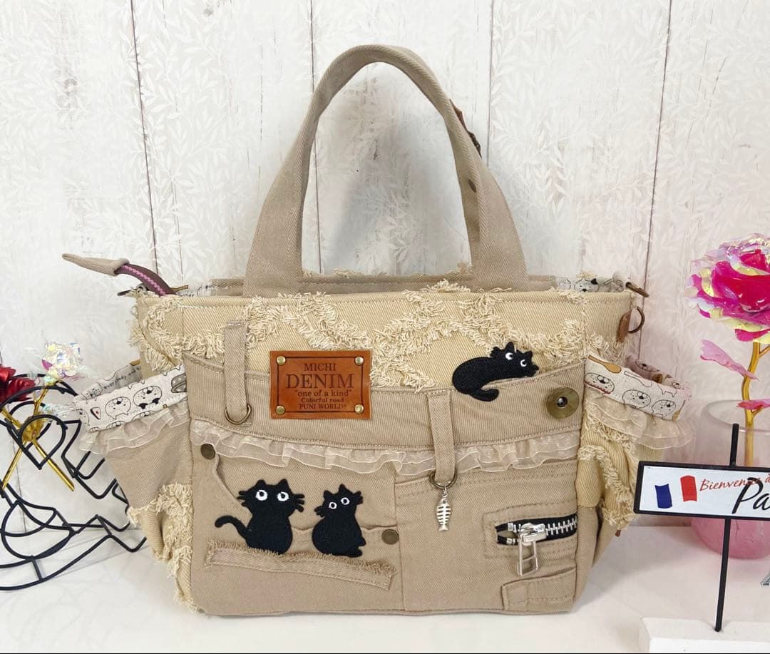 デニムリメイクバックS 茶フリンジ猫