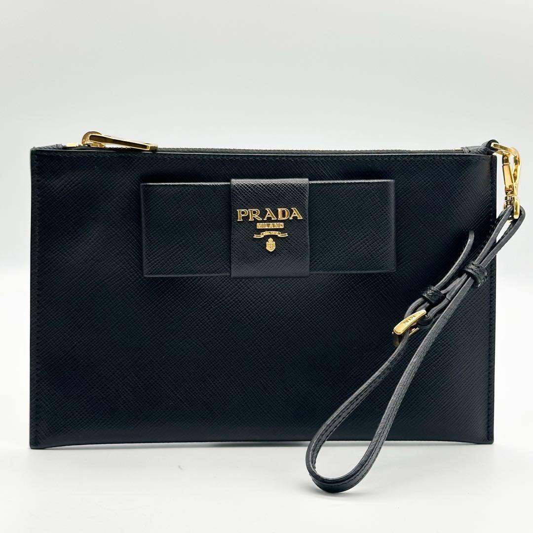【使用わずか】プラダ リストレット リボン クラッチバッグ サフィアーノ ポーチ
