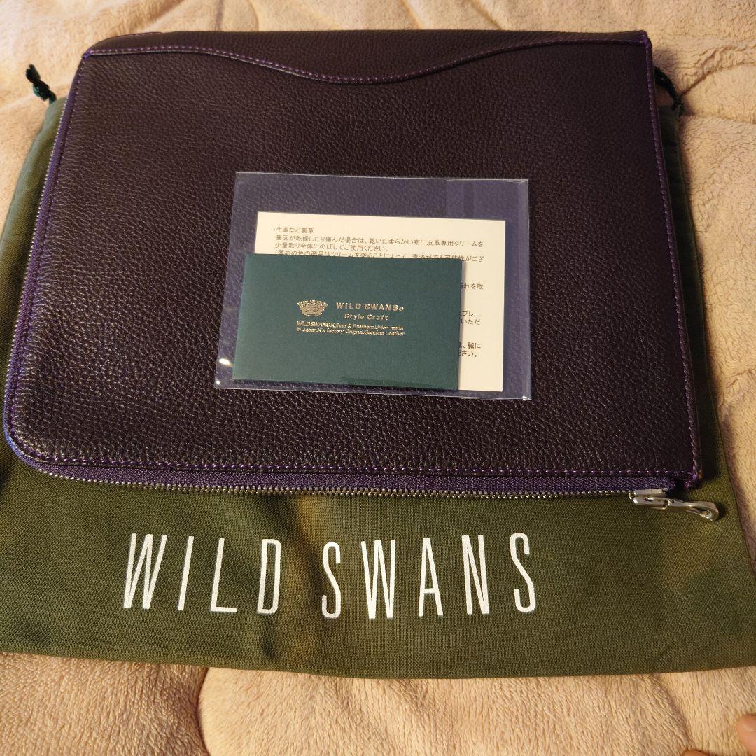 ワイルドスワンズ フォセット クラッチバッグ 王冠ロゴ パープル