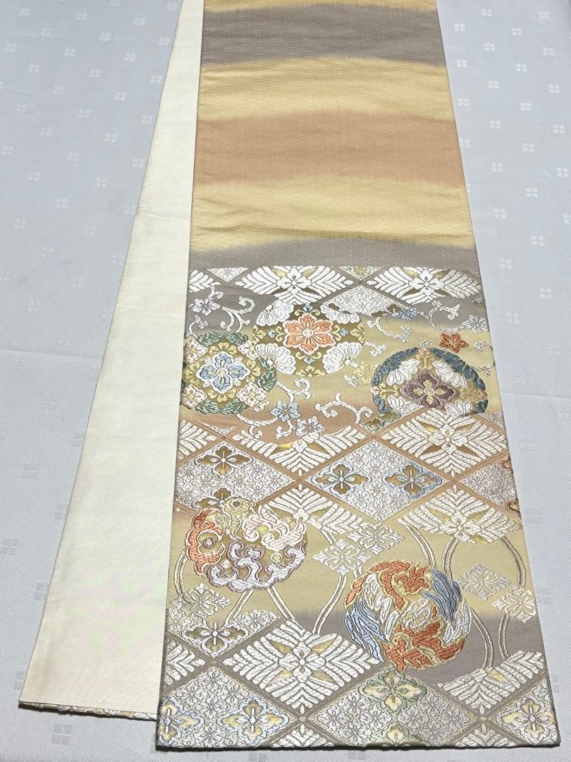 未使用品　和服帯　正絹　本唐織　吉祥文様　袋帯(六通) 帯封付
