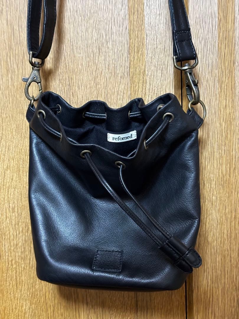 CCU refomed “KINCHAKU” CCU LEATHER BAG