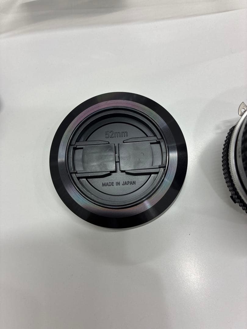 NIKKOR 28mm F2.8MF単焦点レンズフード付 52mmオールドレンズ
