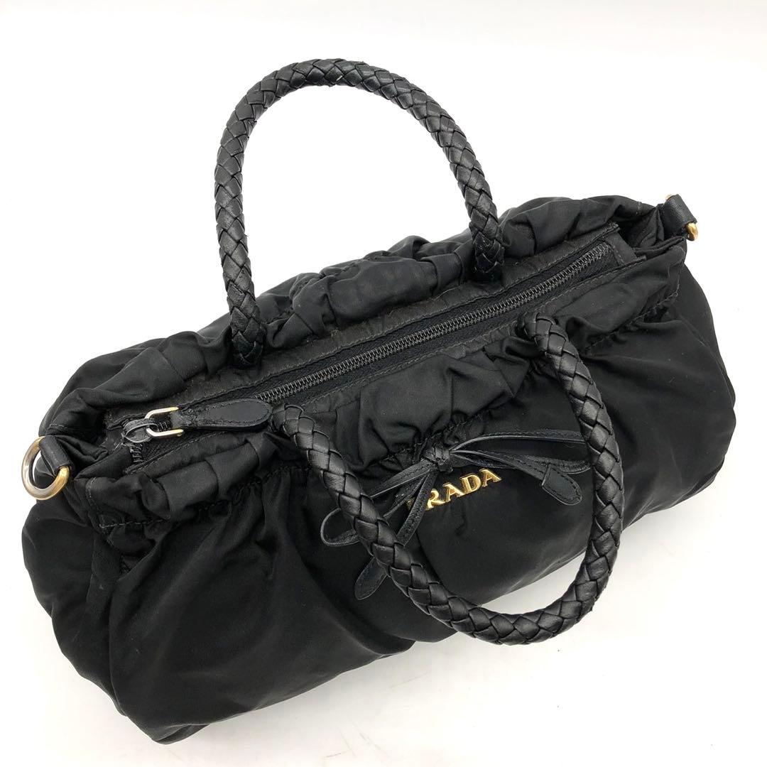 ✨ギャランティ付✨プラダ ハンドバッグ 2way ロゴ金具 リボン ナイロン 黒