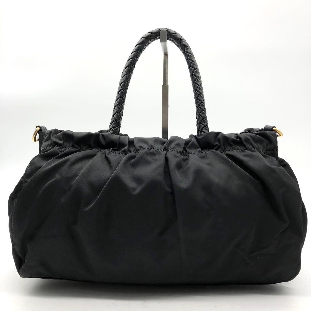 ✨ギャランティ付✨プラダ ハンドバッグ 2way ロゴ金具 リボン ナイロン 黒