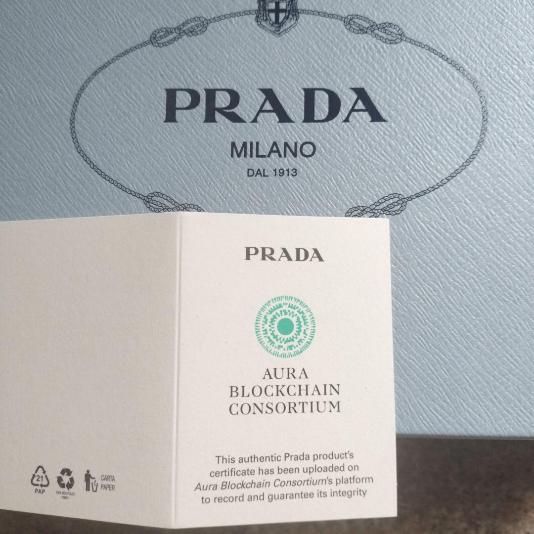 PRADA 黒とベージュのミュール