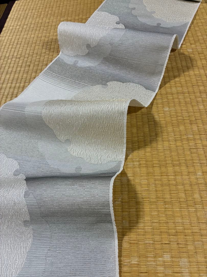 粋でモダンな装い！西陣全通名古屋帯 綿芯本仕立ガード加工済　雪輪文 簡易包装