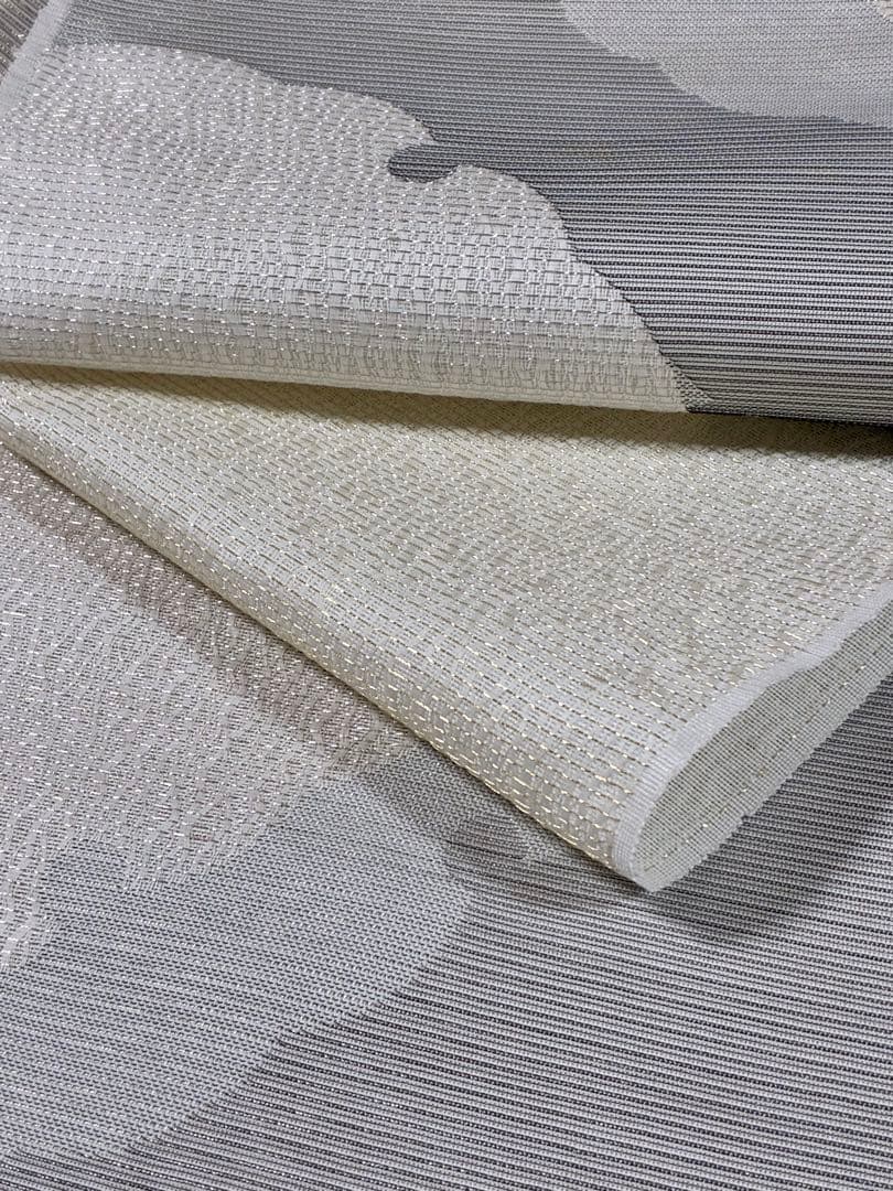 粋でモダンな装い！西陣全通名古屋帯 綿芯本仕立ガード加工済　雪輪文 簡易包装