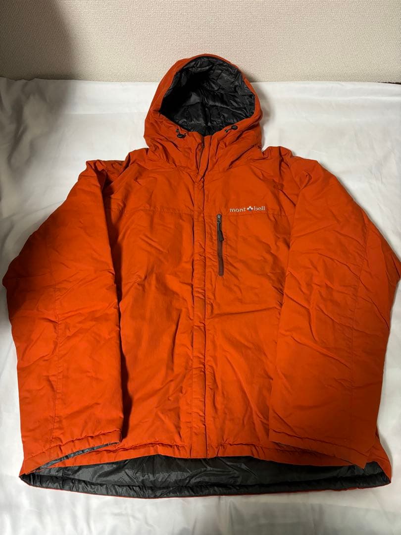 人気モンベル725FP コロラドパーカ　メンズLリバーシブルダウンオレンジグレー
