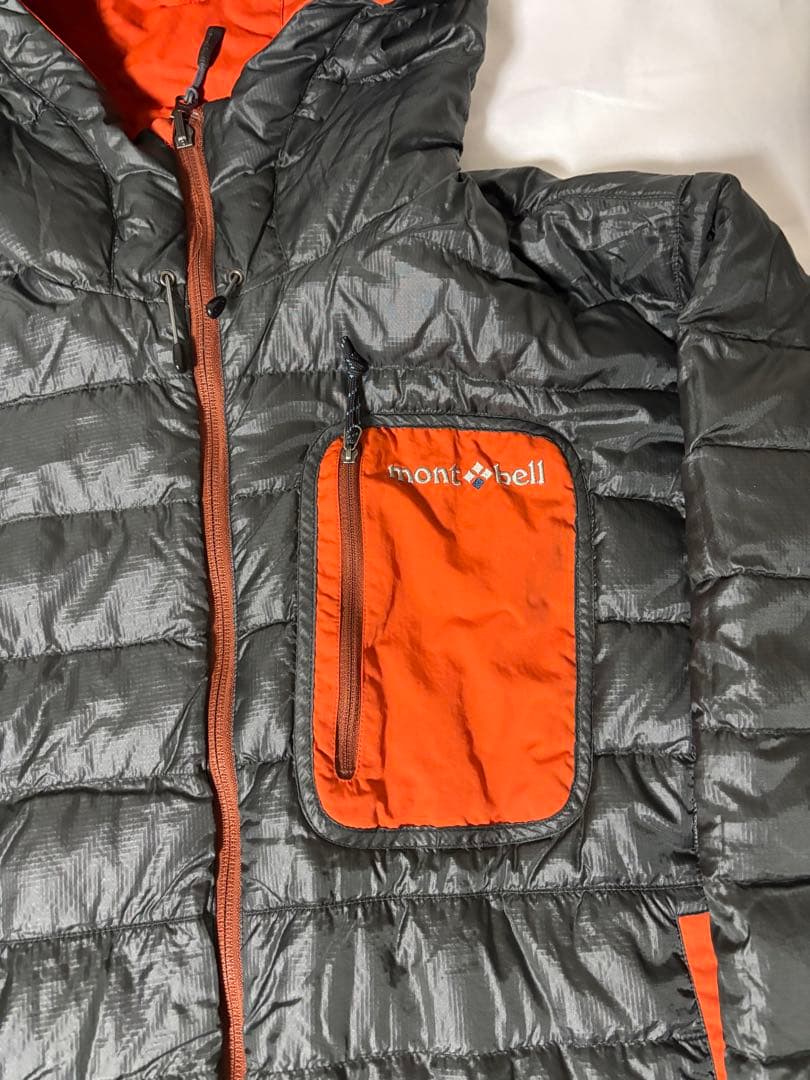 人気モンベル725FP コロラドパーカ　メンズLリバーシブルダウンオレンジグレー