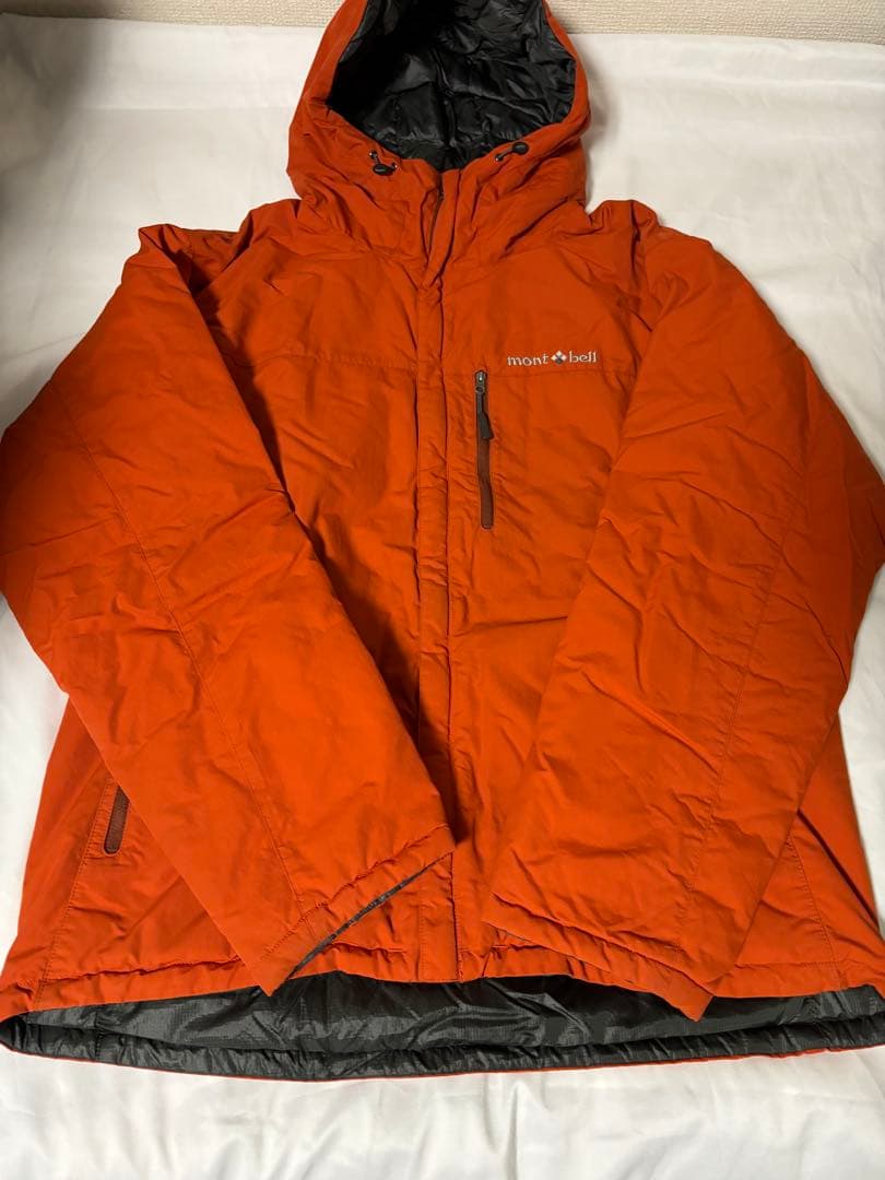 人気モンベル725FP コロラドパーカ　メンズLリバーシブルダウンオレンジグレー