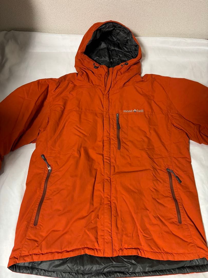 人気モンベル725FP コロラドパーカ　メンズLリバーシブルダウンオレンジグレー