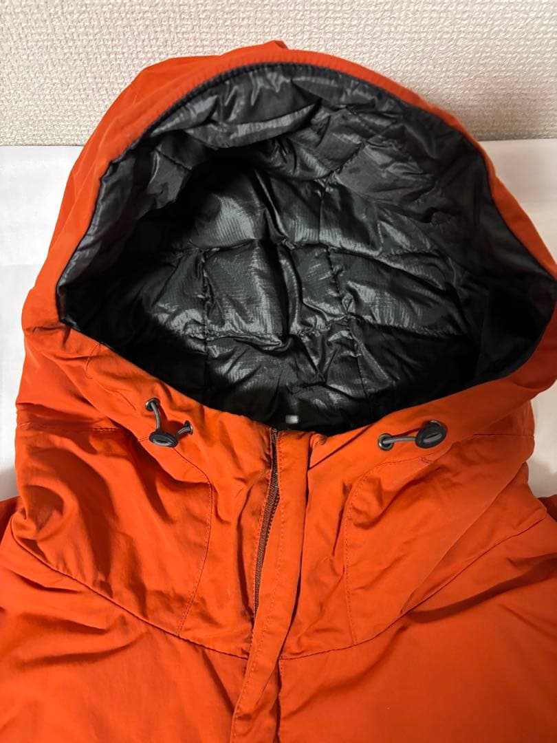 人気モンベル725FP コロラドパーカ　メンズLリバーシブルダウンオレンジグレー