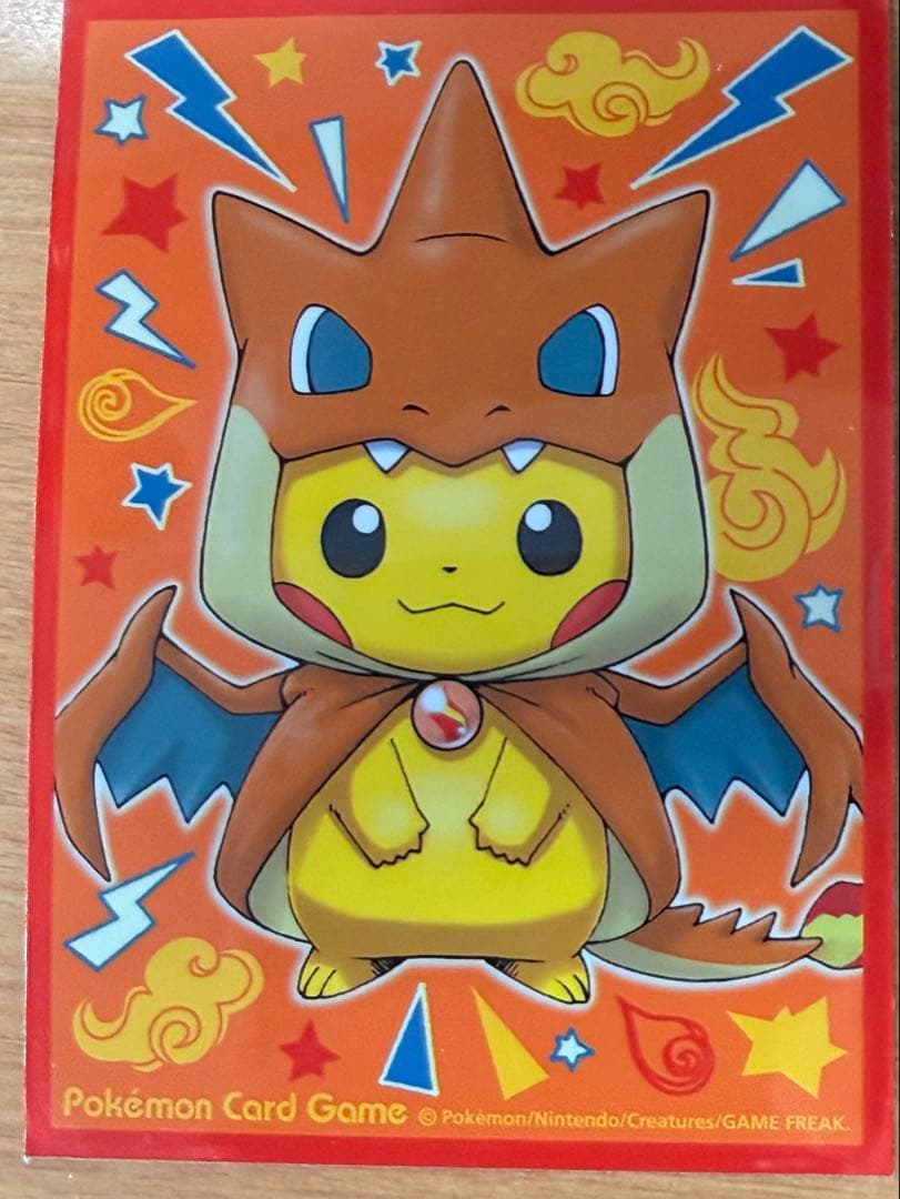 ピカチュウプロモ206/xy　メガリザードンYのポンチョピカチュウのスリーブ付き