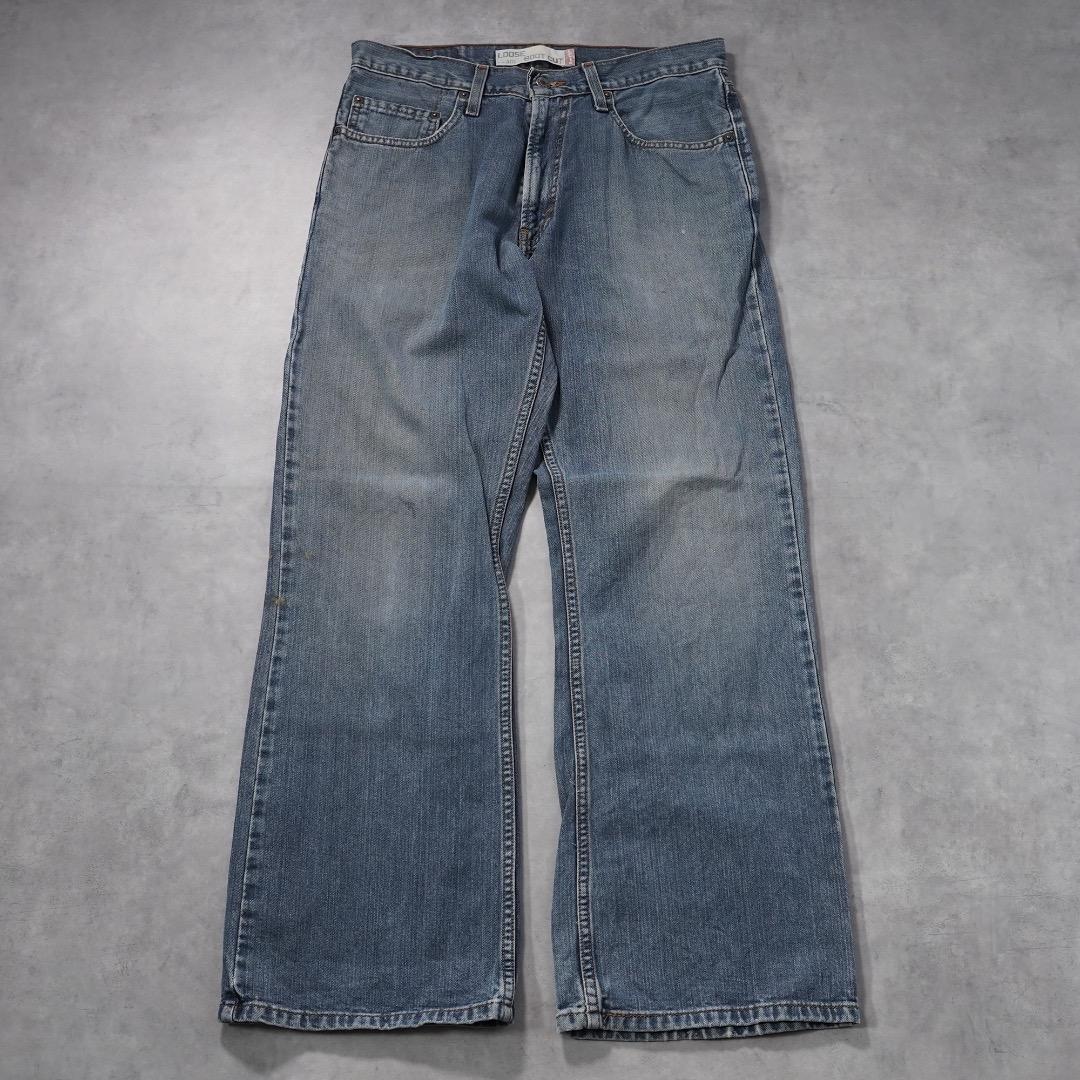 リーバイス567 古着 W32 フレア ブーツ ボトム 青 00s 18707