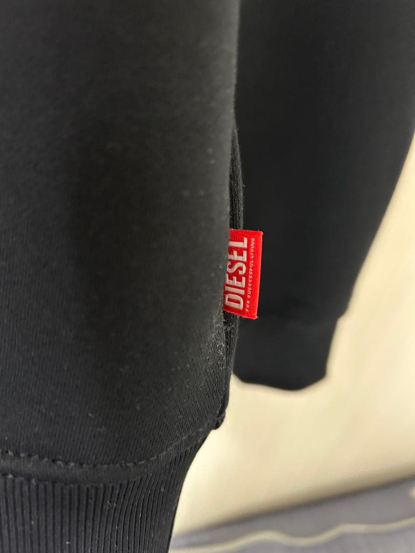 DIESELアイプリント ブラックメンズ スウェット プルオーバー プリント