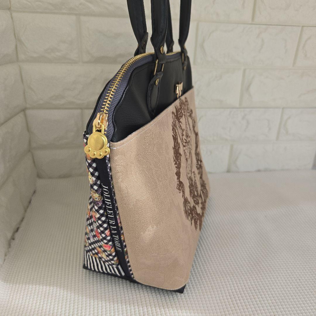 ジョリーフルール　エピファニー　合皮丸型バッグ