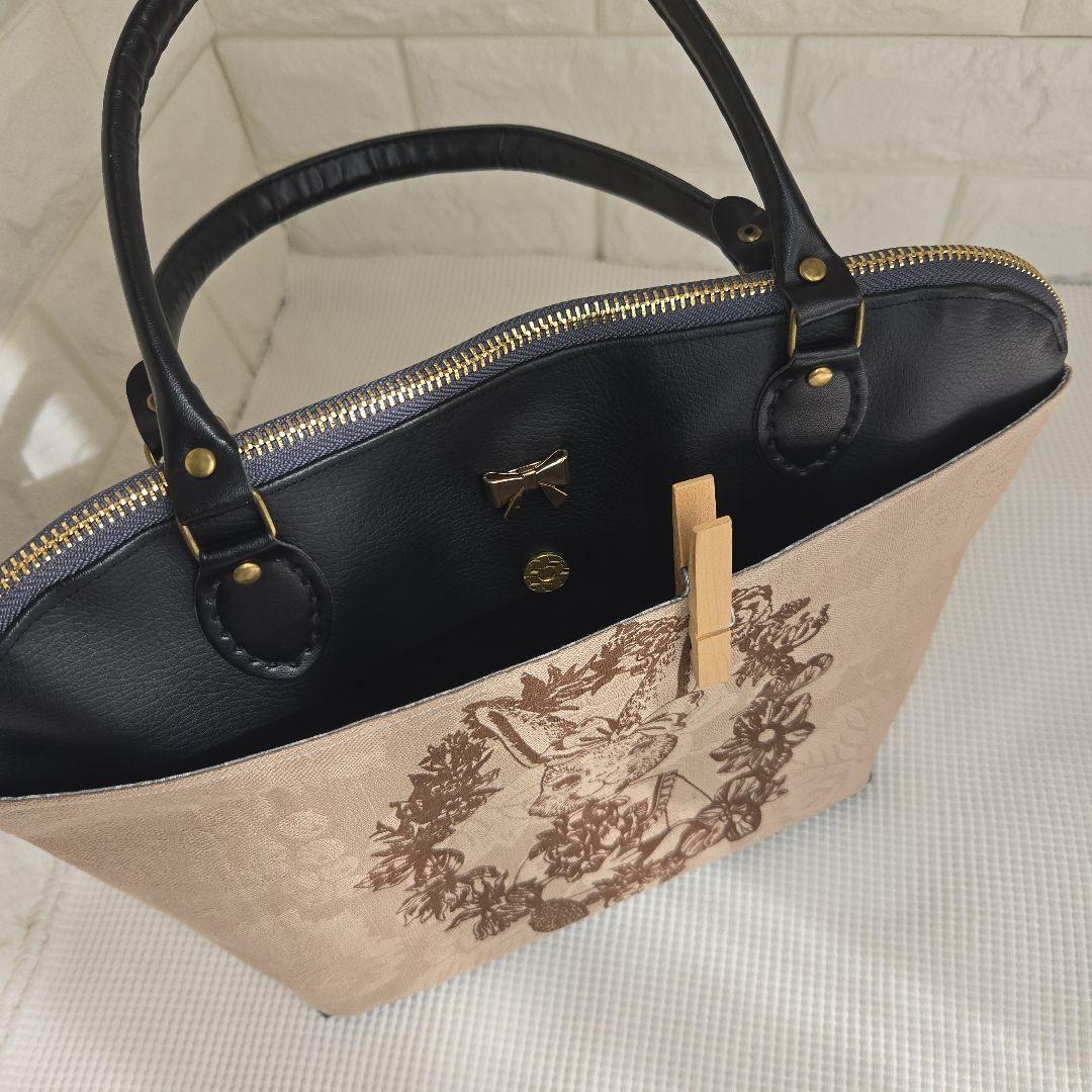 ジョリーフルール　エピファニー　合皮丸型バッグ