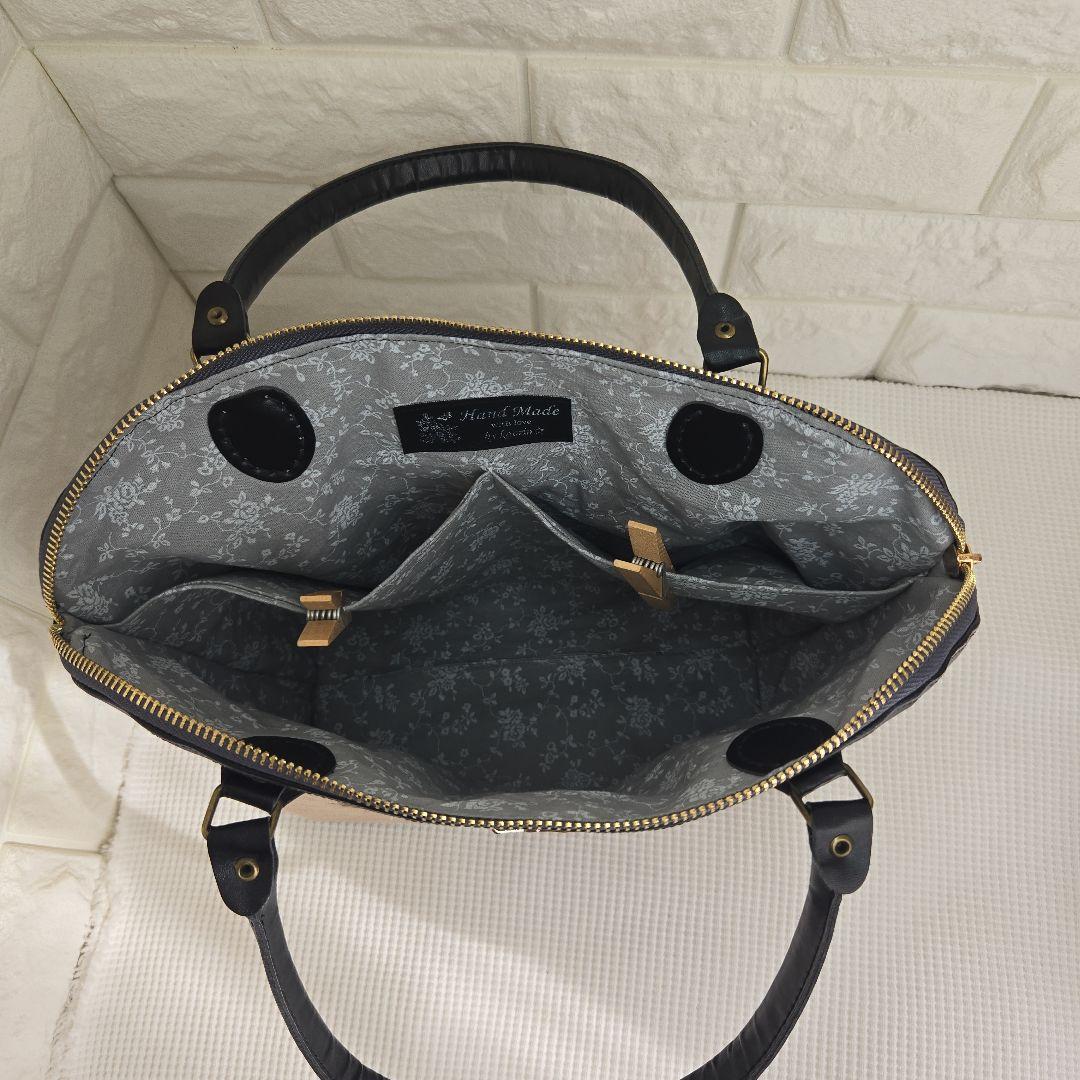 ジョリーフルール　エピファニー　合皮丸型バッグ