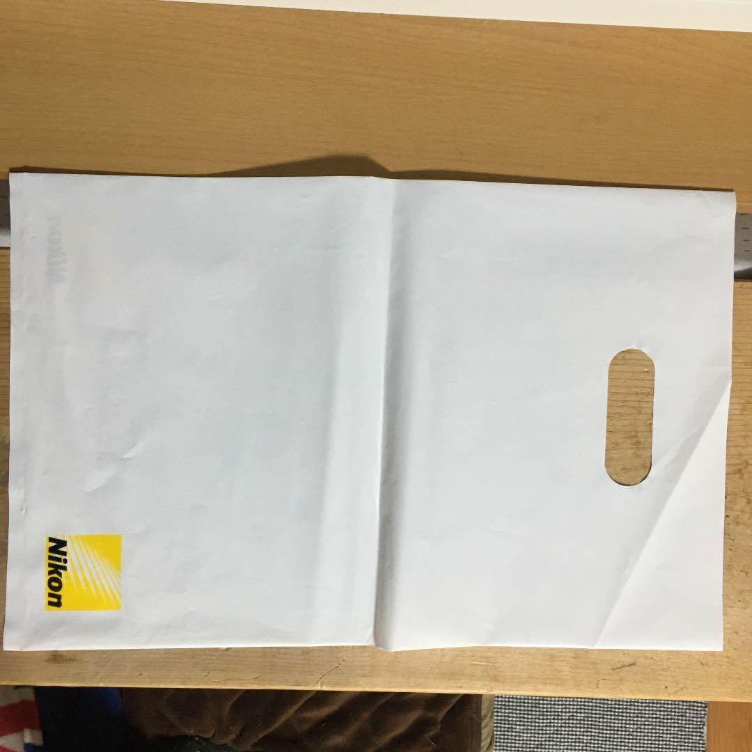 Nikon スワロフスキー 創立100周年記念 キーホルダー&社史