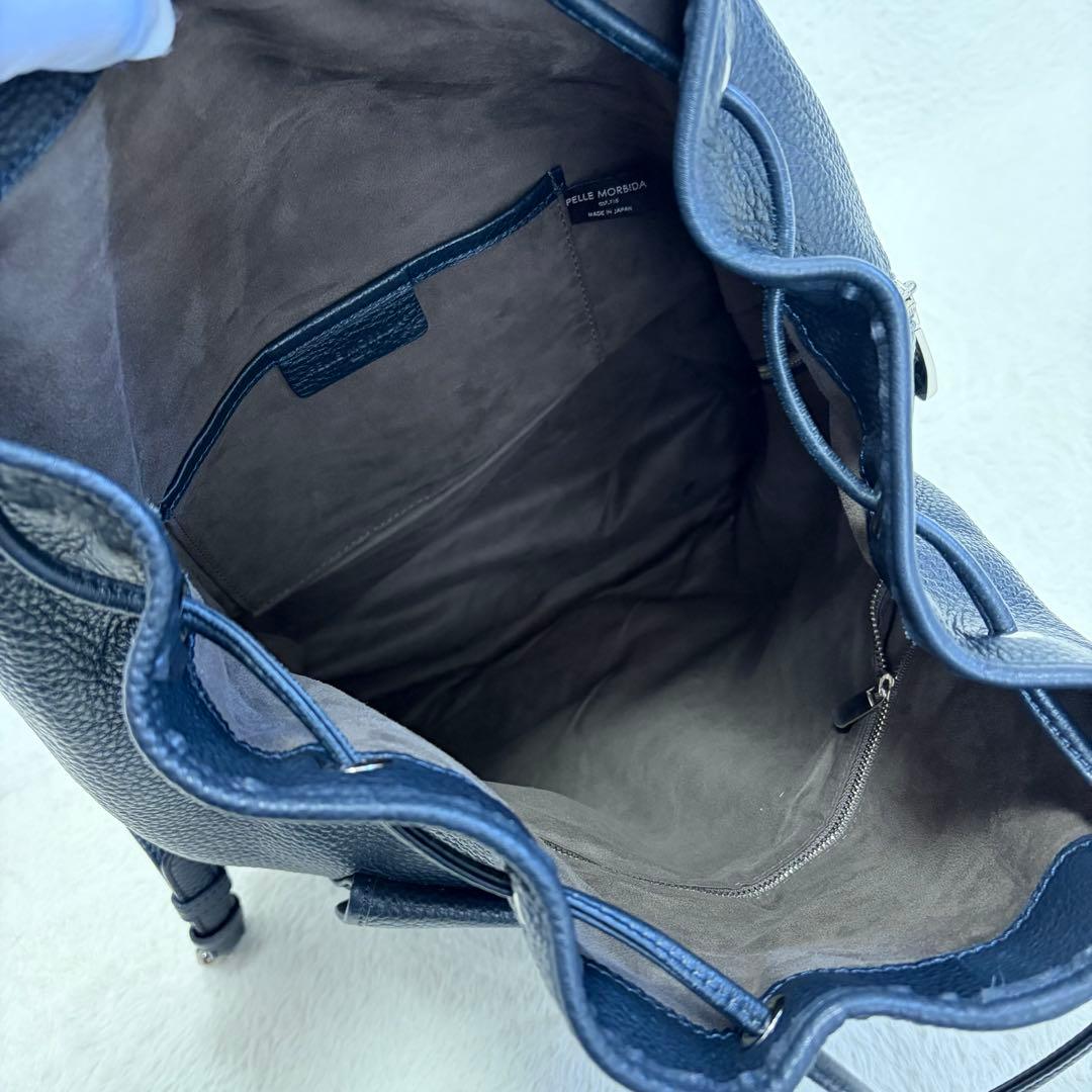 ペッレモルビダ メイデンボヤージュ フラップバックパック リュック レザー 紺色