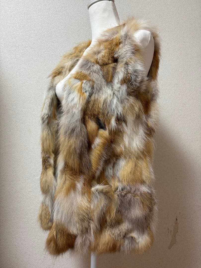 ベージュ系ファー ノーカラーベスト　グレースコンチネンタル